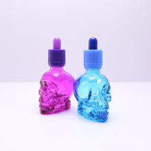 Hot selling 1oz skull dripper bottles skull head glass eliquid dropper bottle wellbottle SGB-003Z